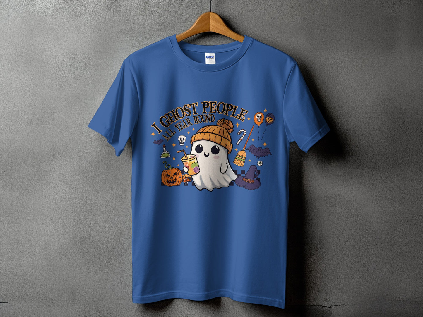 Blue t-shirt with a Halloween-themed graphic of a ghost and the text "I Ghost People All Year Round".