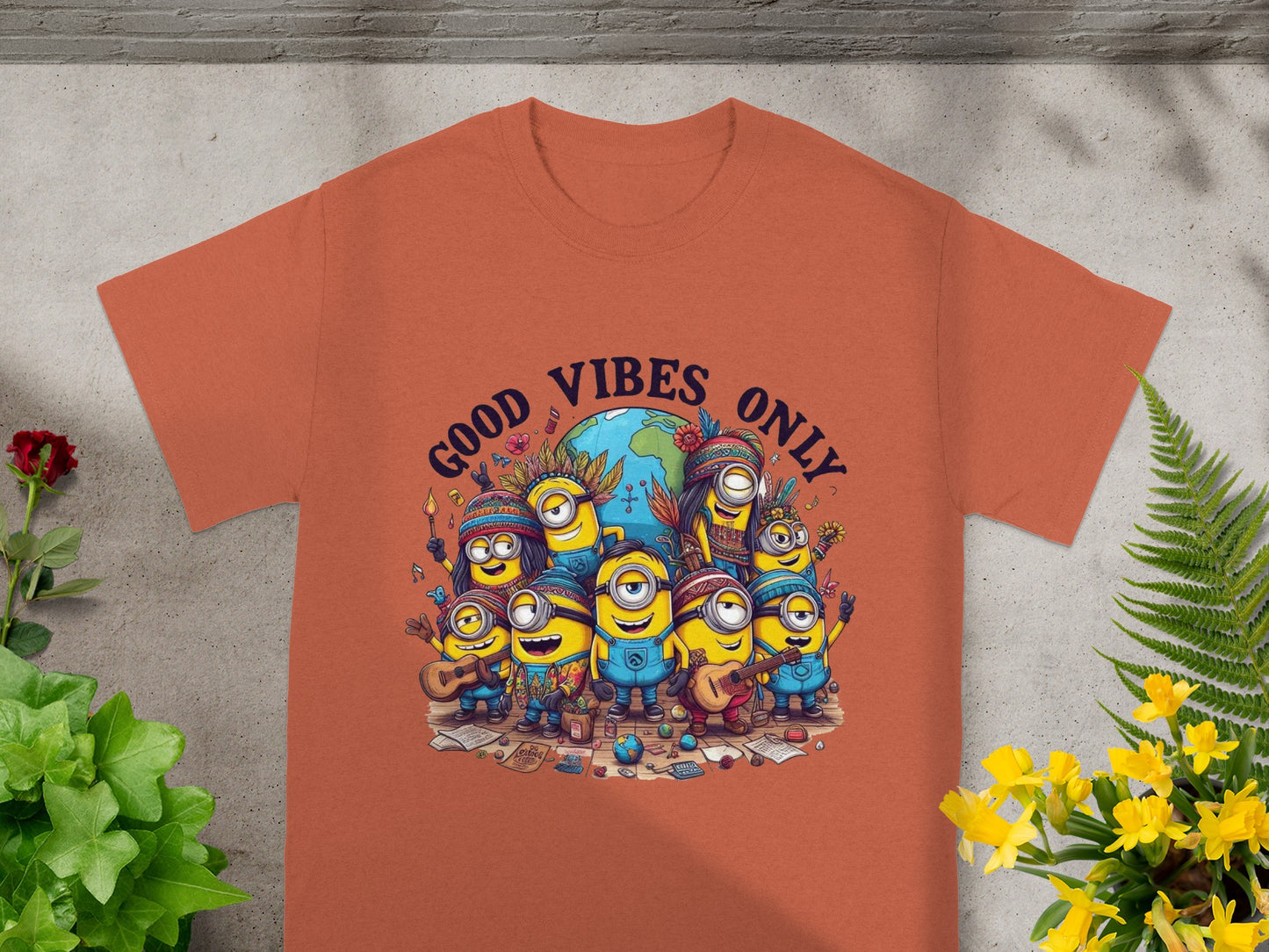 Minions wearing bohemian outfits around a globe with text "GOOD VIBES ONLY".
