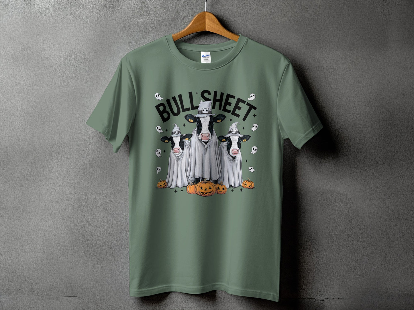 Three cows in ghost costumes with pumpkins and ghosts, text reads "BULL' SHEET".