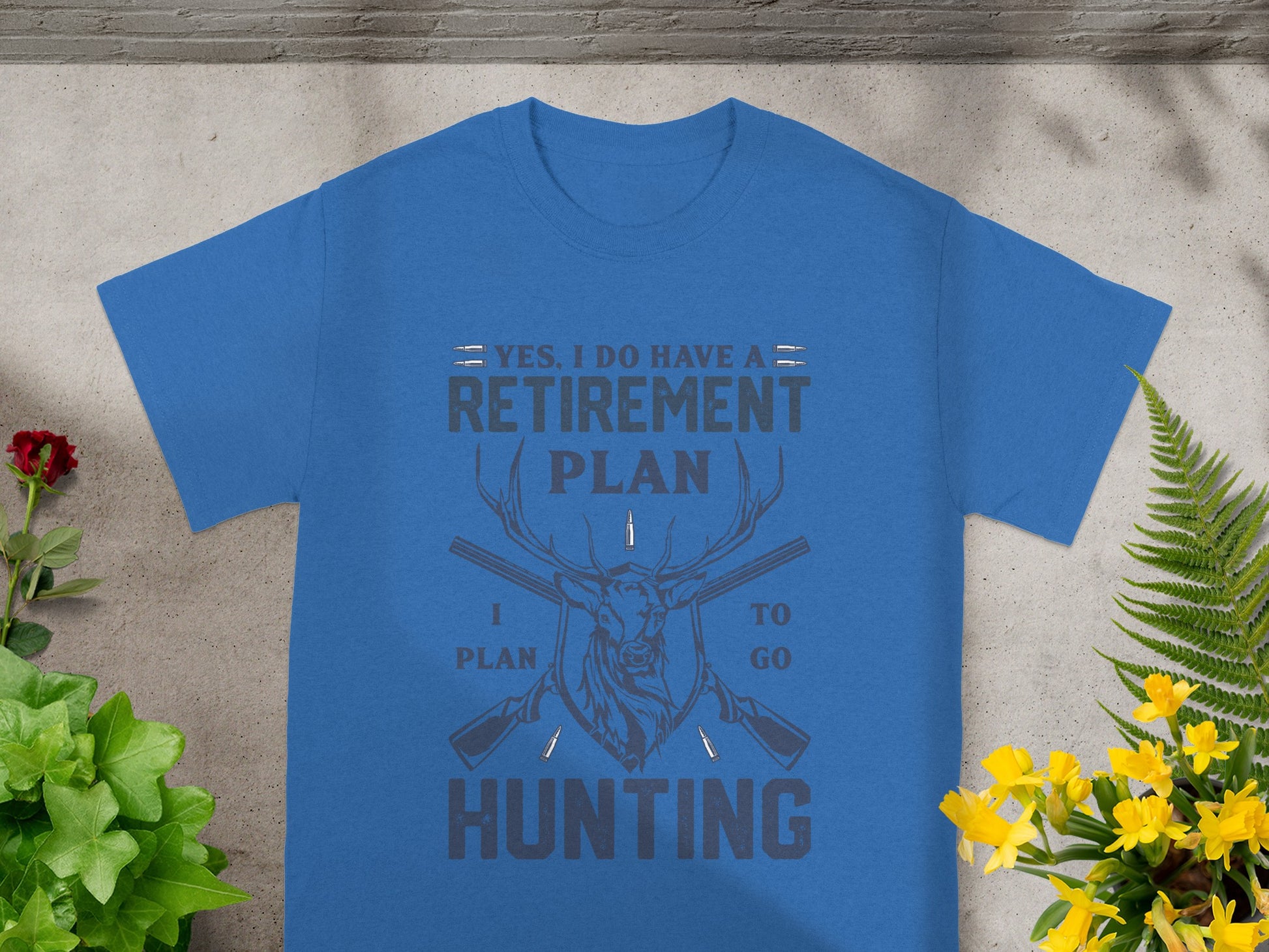 Blue t-shirt with "Yes, I Do Have A Retirement Plan" and deer graphic.