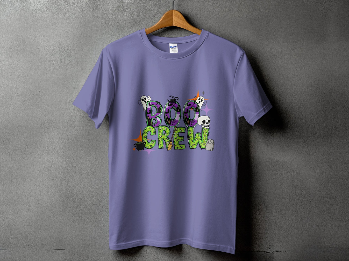 Purple t-shirt with "Boo Crew" text and Halloween graphics.