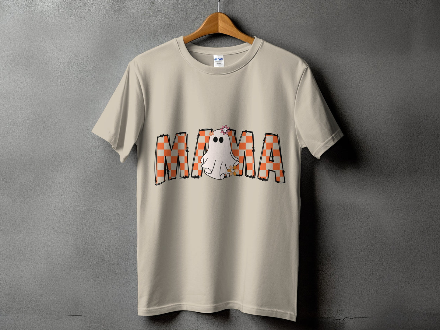 Light tan t-shirt with orange checkered "MAMA" text and a cute ghost.