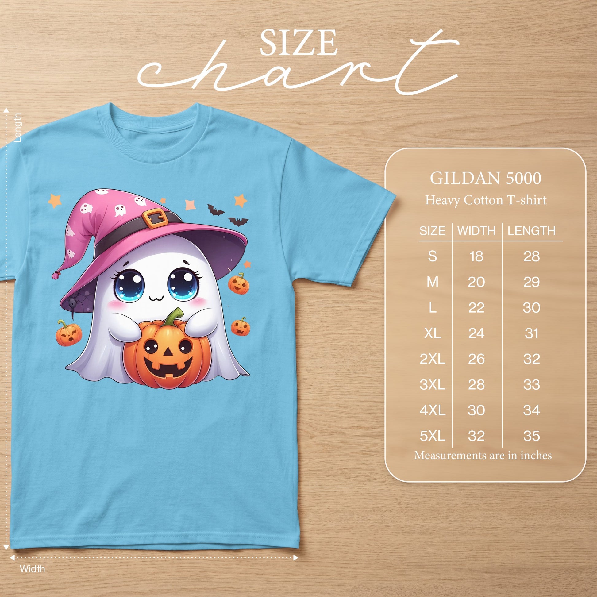 Light blue t-shirt with a kawaii ghost in a witch hat holding a jack-o'-lantern.