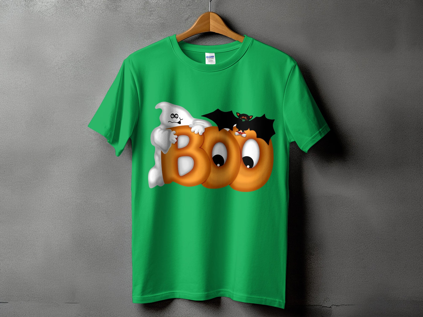 Green t-shirt with Halloween ghost, bat, and "BOO" text graphic.