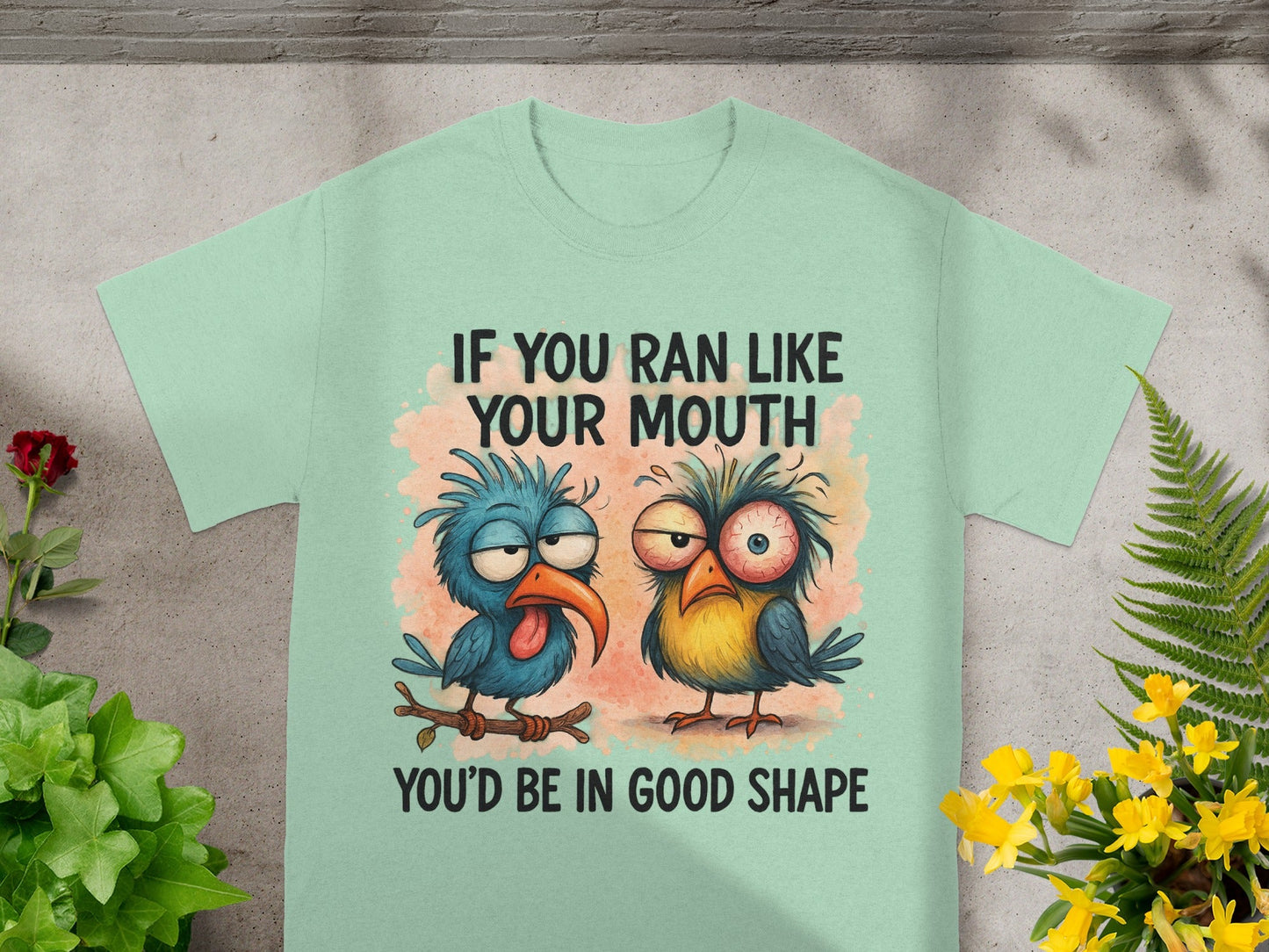 T-shirt with cartoon birds and text "IF YOU RAN LIKE YOUR MOUTH YOU'D BE IN GOOD SHAPE".