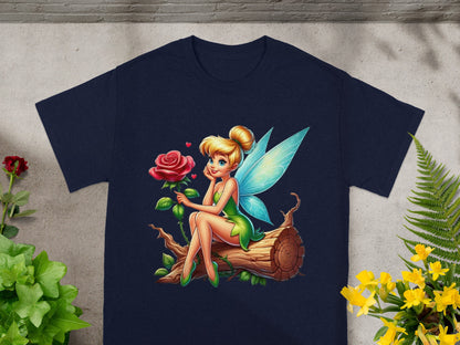 Tinkerbell sits on a log holding a rose.
