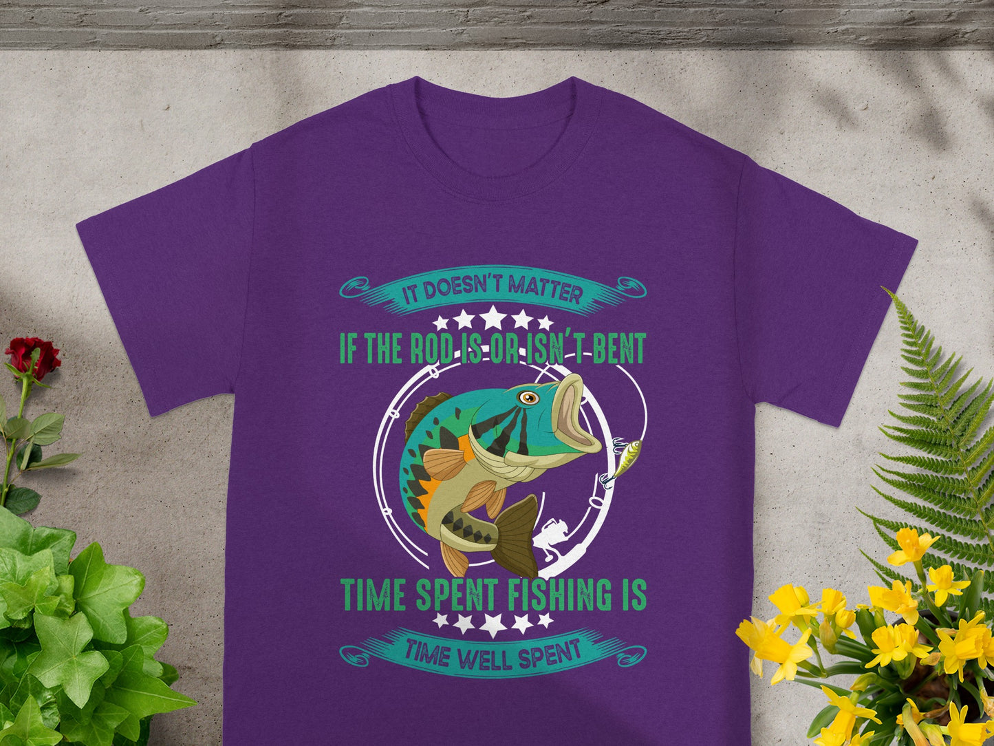 Purple t-shirt with fishing graphic and text "Time spent fishing is time well spent".