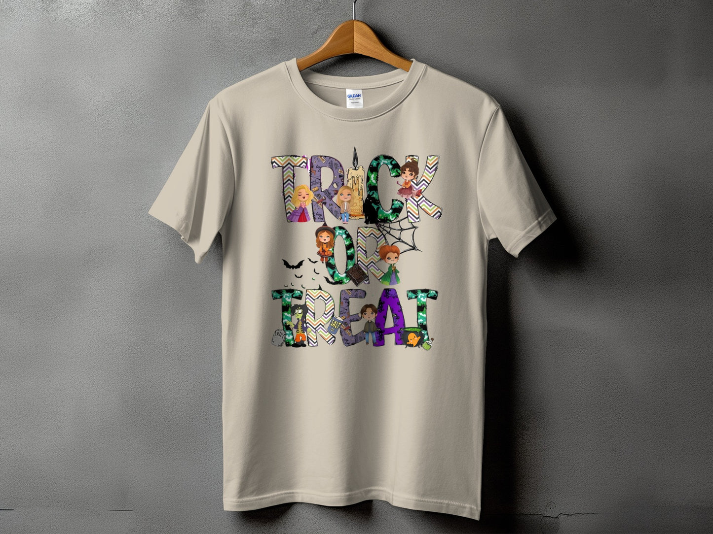 Light beige t-shirt with "Trick or Treat" graphic featuring cartoon characters and Halloween imagery.