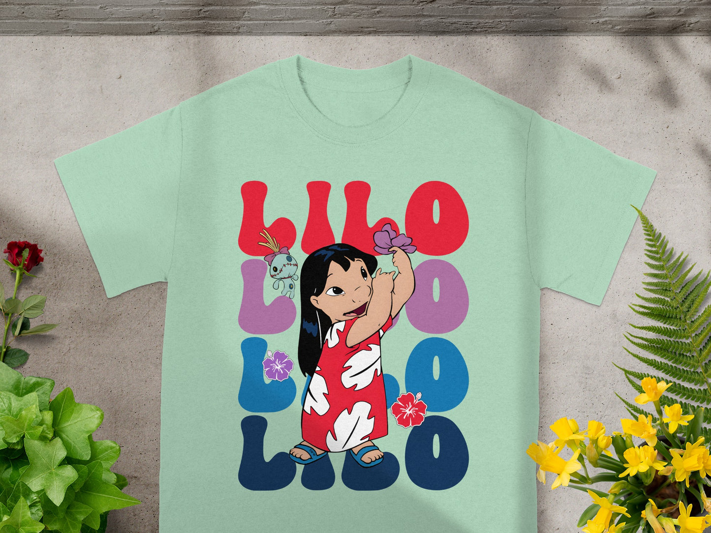 Lilo and Stitch graphic t-shirt with large colorful lettering.