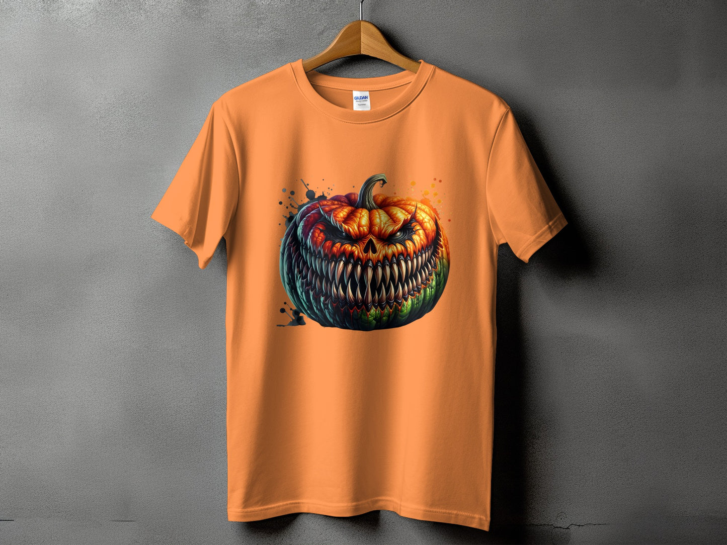 Orange t-shirt with a fierce, multi-colored jack-o'-lantern graphic.
