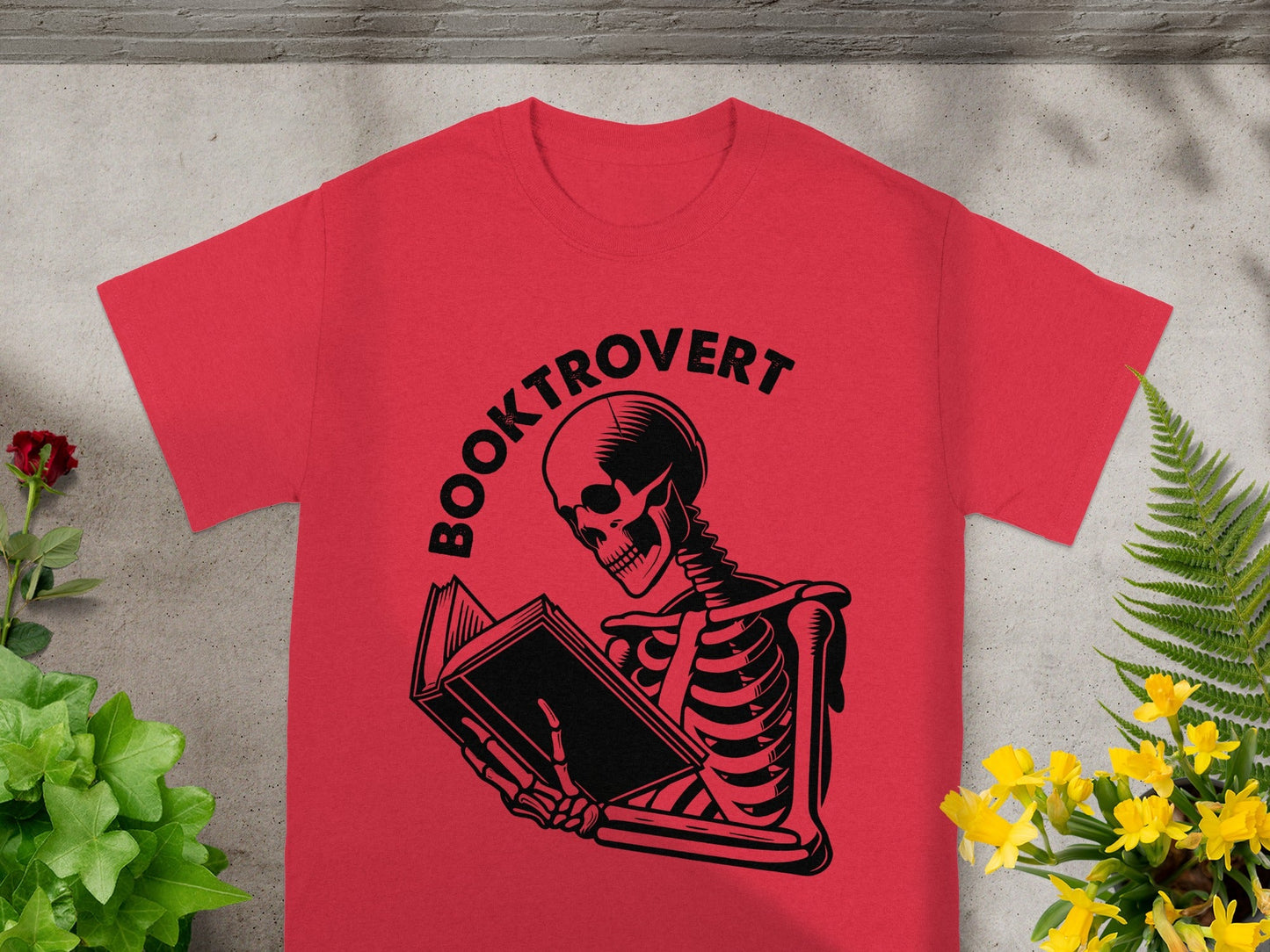 Booktrovert Skeleton Reading Book Graphic Tee