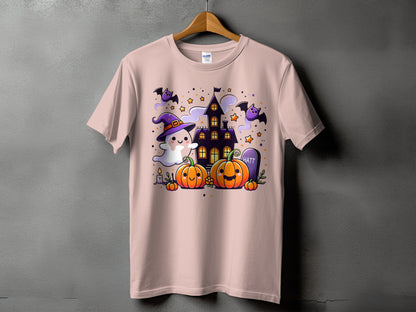 Pink t-shirt with a Halloween graphic featuring a ghost, pumpkins, bats, and a haunted house.