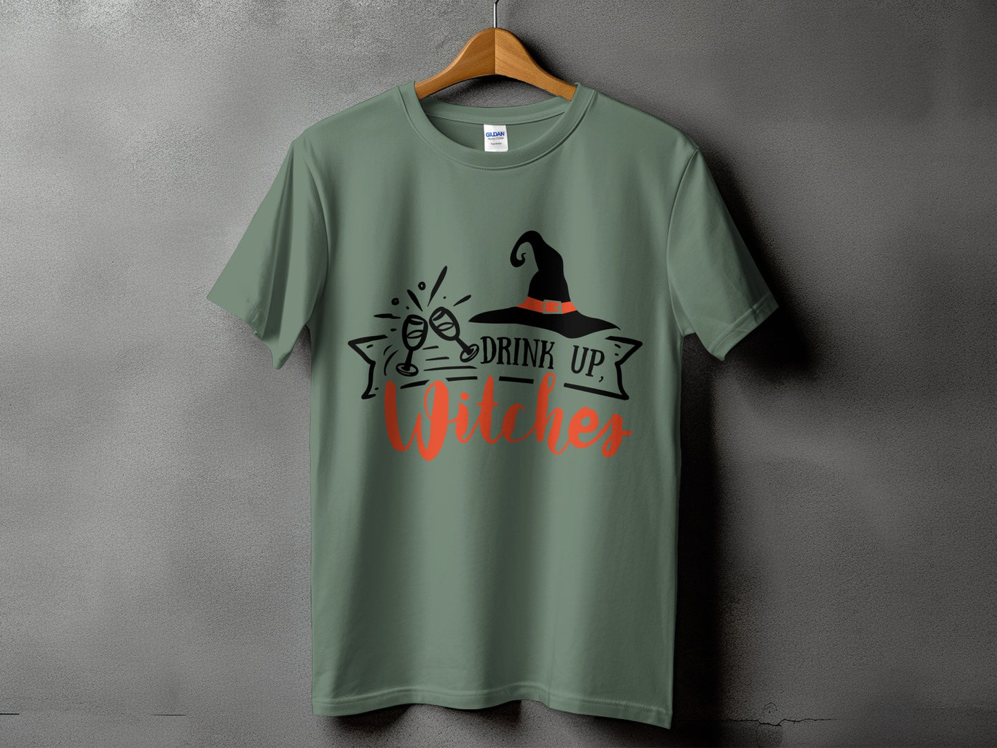 Green t-shirt with "Drink Up, Witches" text and Halloween graphic.