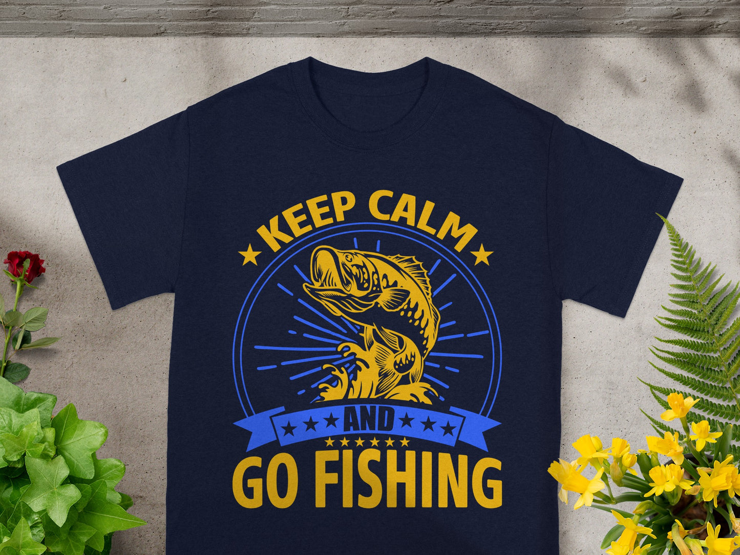 Navy t-shirt with text "Keep Calm and Go Fishing" and a yellow fish graphic.
