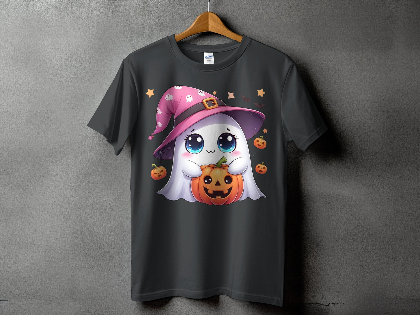 Dark grey t-shirt with a cute ghost wearing a witch hat holding a pumpkin.