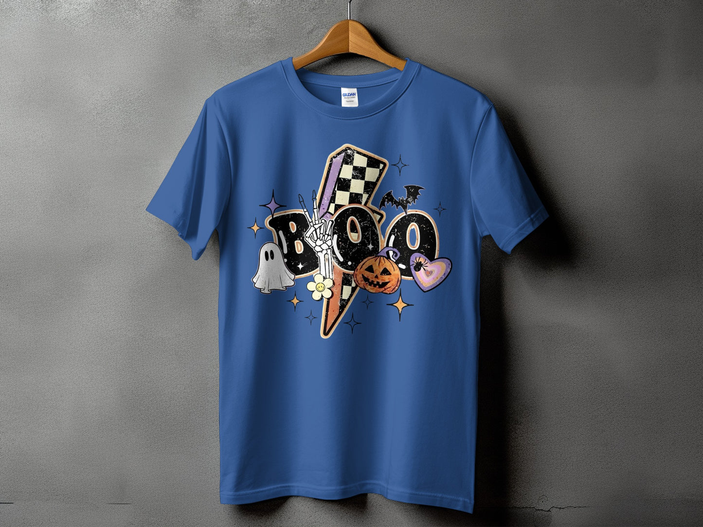 Blue t-shirt with "BOO" Halloween graphic featuring a ghost, pumpkin, and bat.
