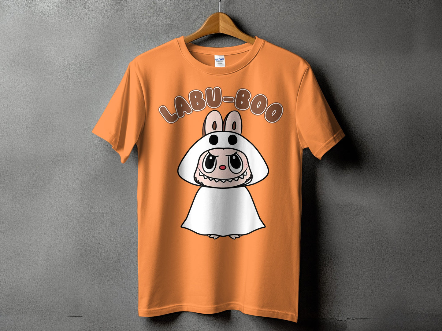 Orange t-shirt with "LABU-BOO" text and a cartoon character in a bunny outfit.
