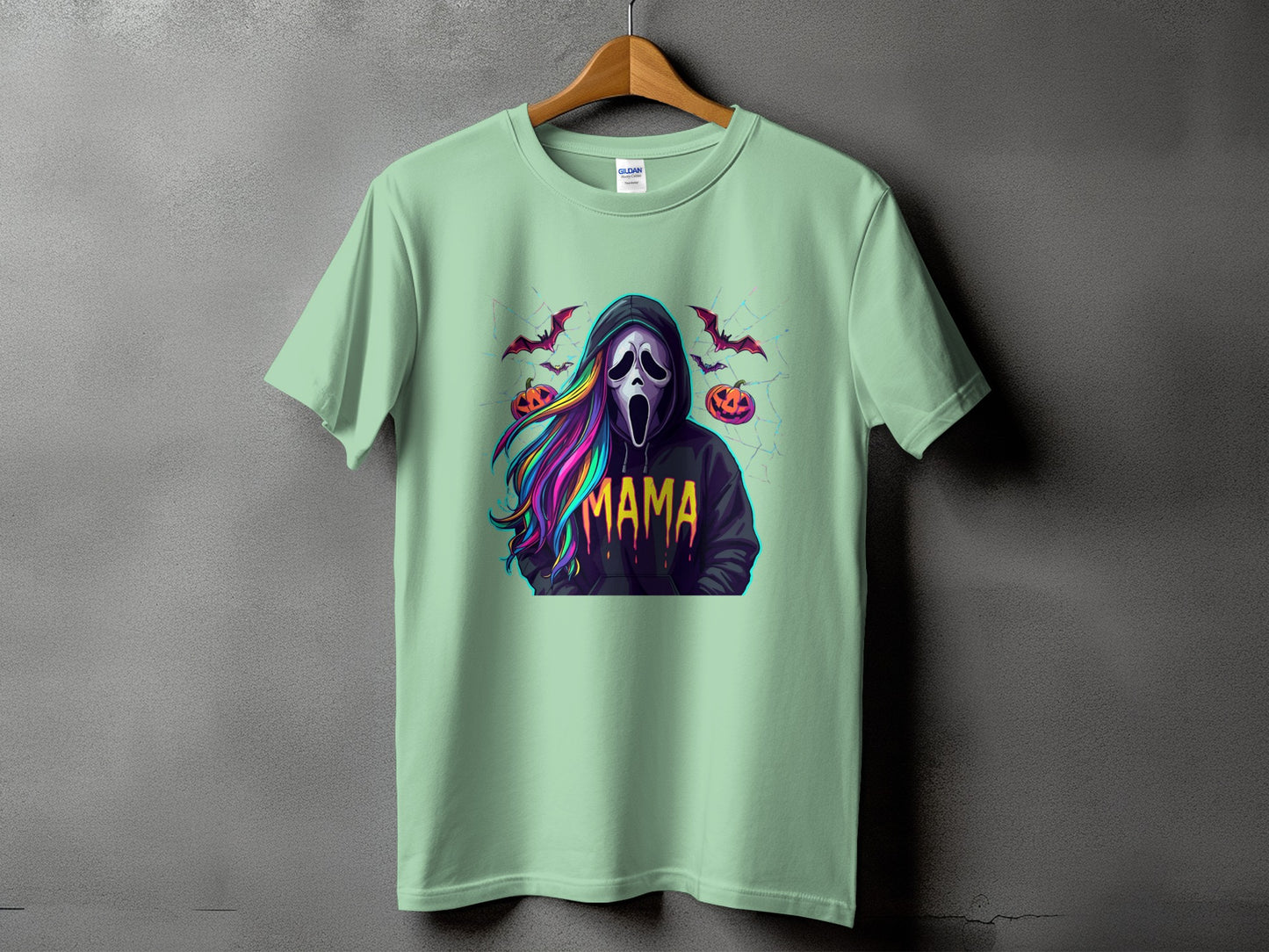 Ghost face with rainbow hair and "Mama" text, surrounded by bats and pumpkins.