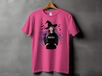 Pink t-shirt with a graphic of a woman in a witch hat, with "MAMA" text.