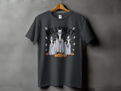 Three cows in ghost costumes with hats and pumpkins with "BULL'SHEET" text.
