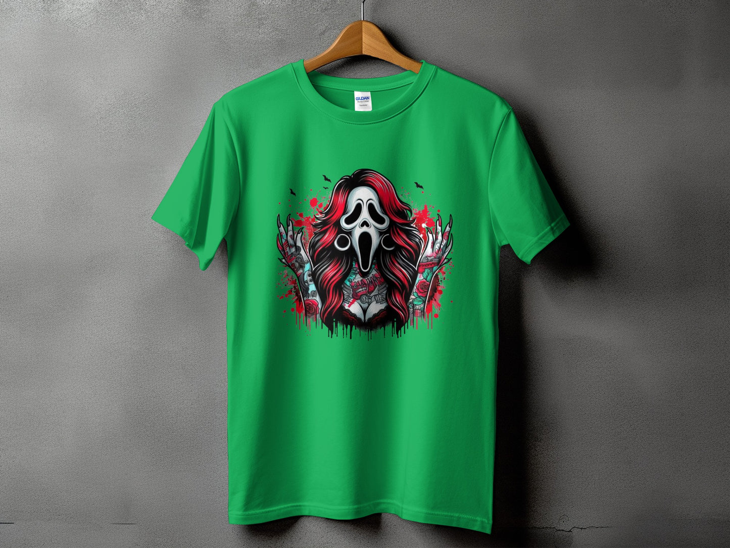 Green t-shirt with a Scream mask, red hair, and tattooed arms with roses.