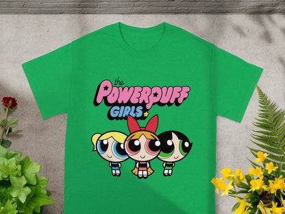 Green t-shirt with The Powerpuff Girls characters Bubbles, Blossom, and Buttercup.