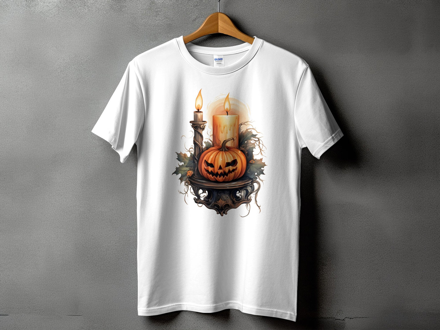White t-shirt with Halloween pumpkin and candles graphic.