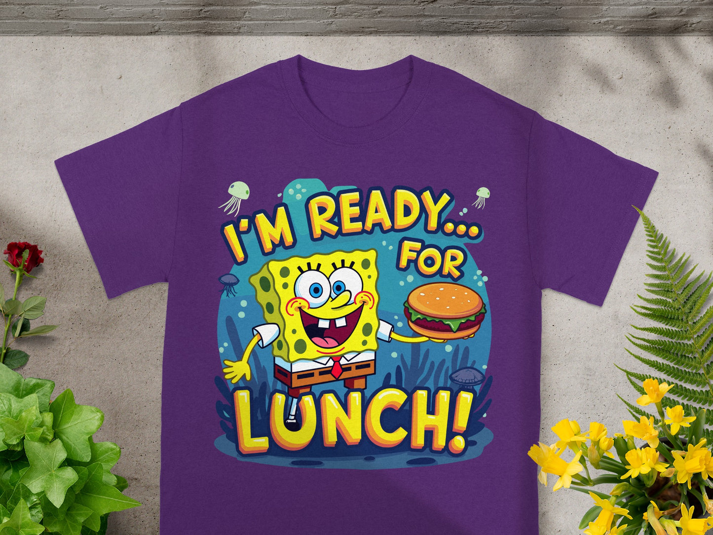 SpongeBob SquarePants on shirt saying "I'M READY FOR LUNCH!" holding a burger.