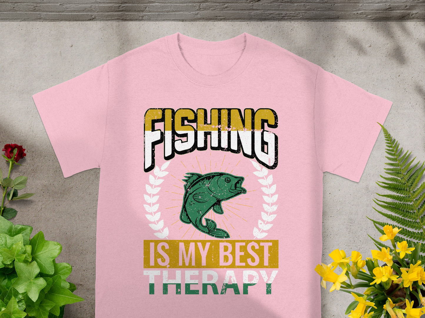 Pink t-shirt with "FISHING IS MY BEST THERAPY" graphic featuring a fish.