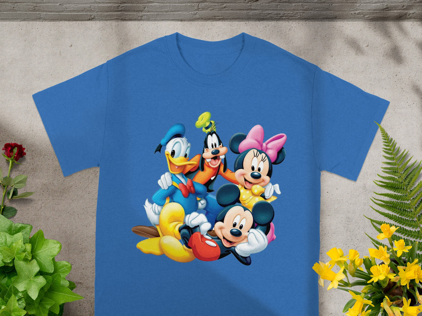Blue t-shirt with Mickey, Minnie, Donald, and Goofy characters.