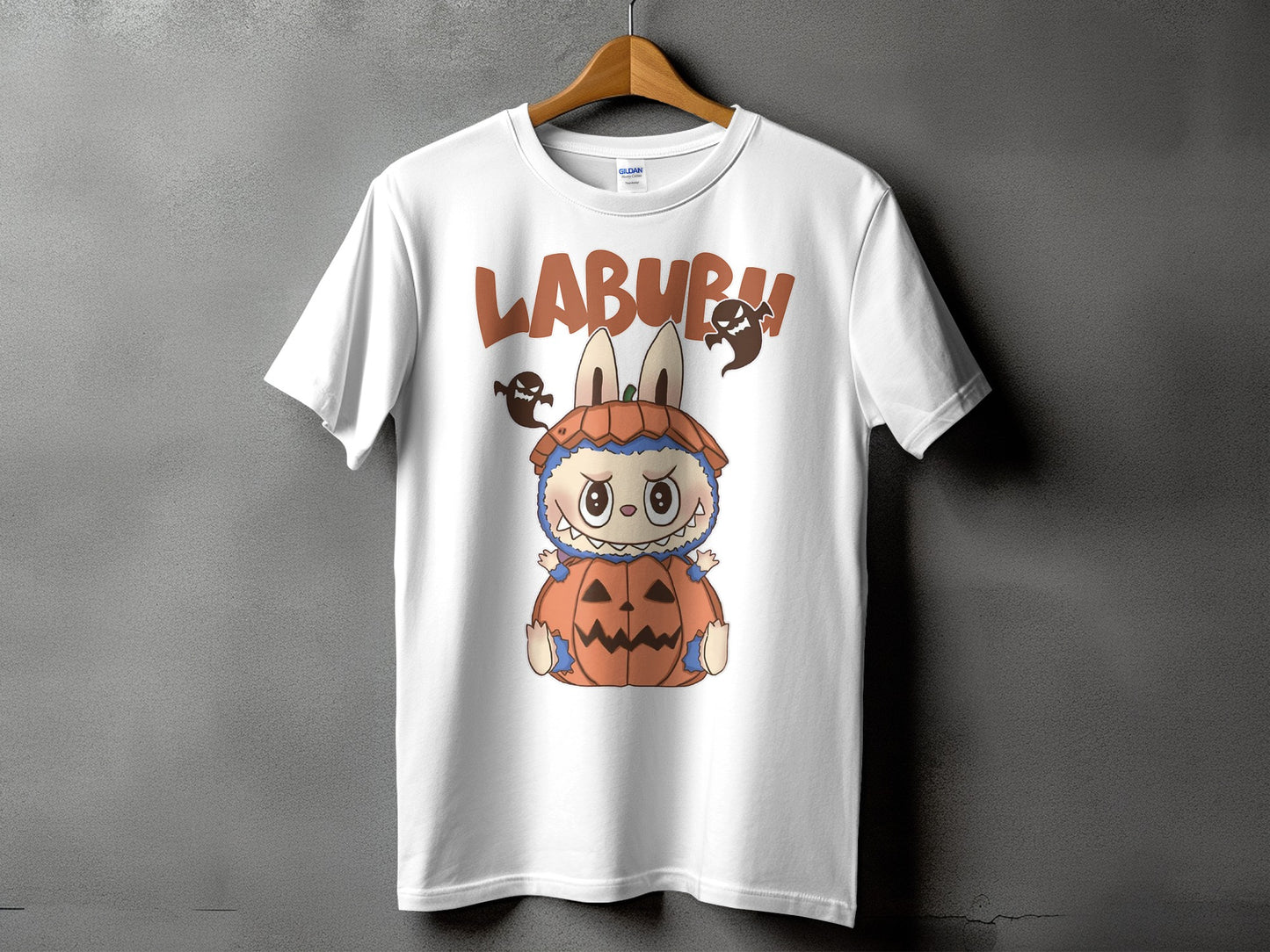 White t-shirt with a "LABURM" graphic featuring a pumpkin monster and ghosts.