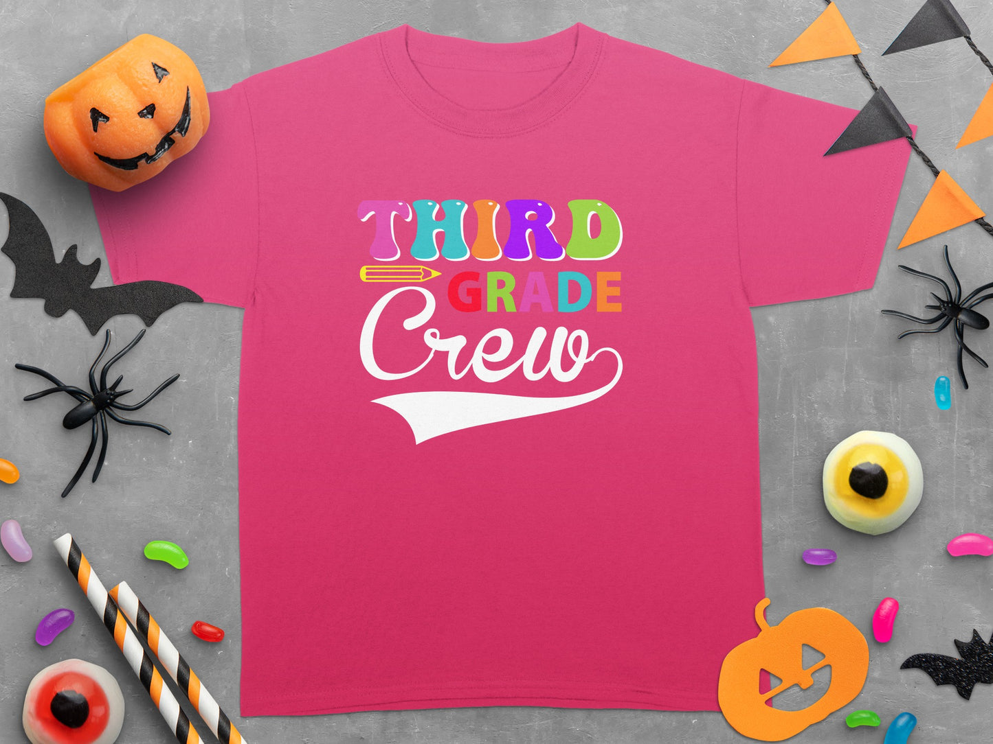 Pink t-shirt with "Third Grade Crew" text and a pencil graphic.