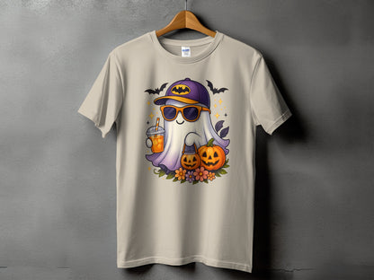 Light tan t-shirt with a cartoon ghost, pumpkins, and bats Halloween graphic.