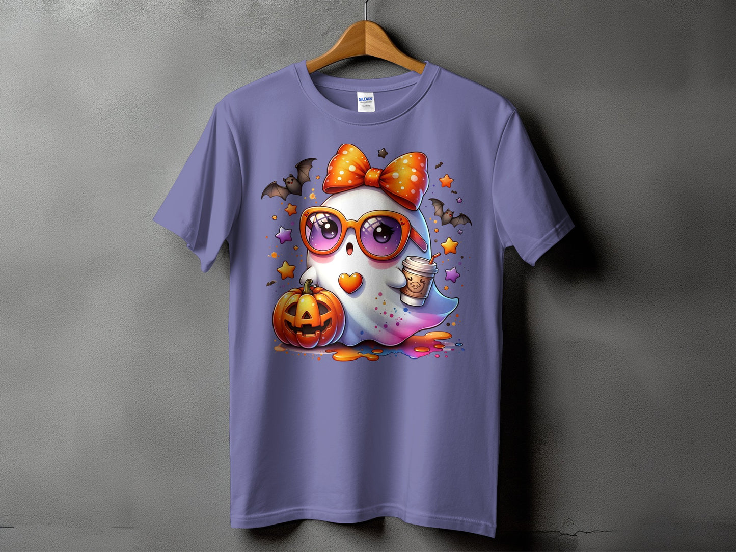 Purple t-shirt with a cute ghost, pumpkin, coffee, bats, and stars graphic.