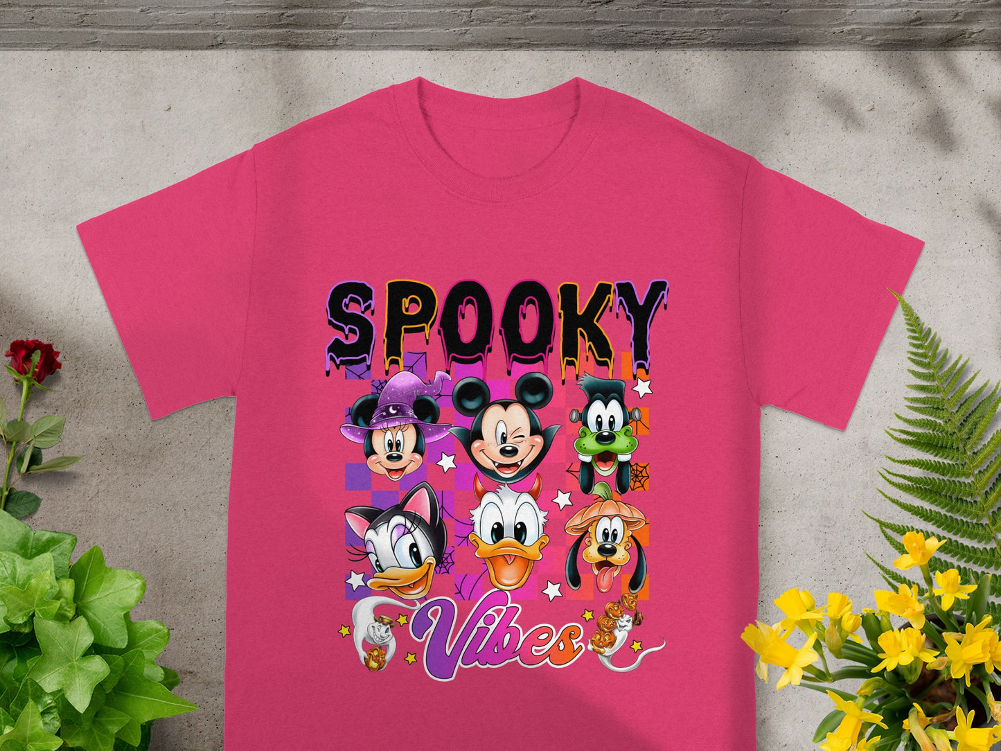 Pink t-shirt with "SPOOKY Vibes" text and Disney Halloween characters.