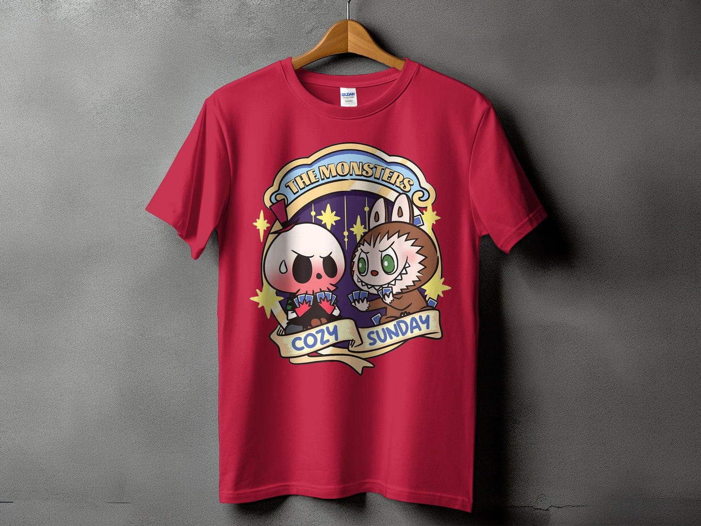 Red t-shirt with a circular graphic of a skull and monster playing cards.