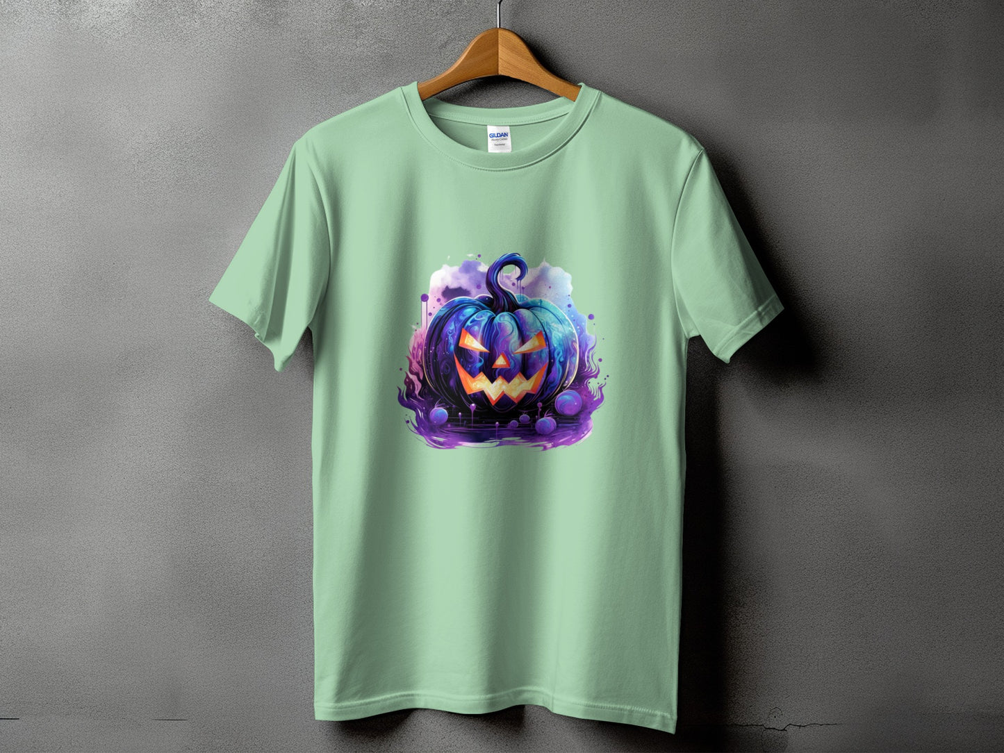 Light green t-shirt with a glowing blue jack-o'-lantern design.