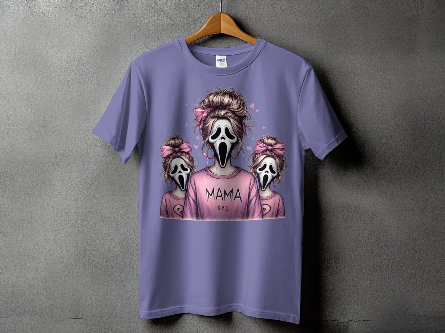 Purple t-shirt with "MAMA" and two ghost figures with pink bows.