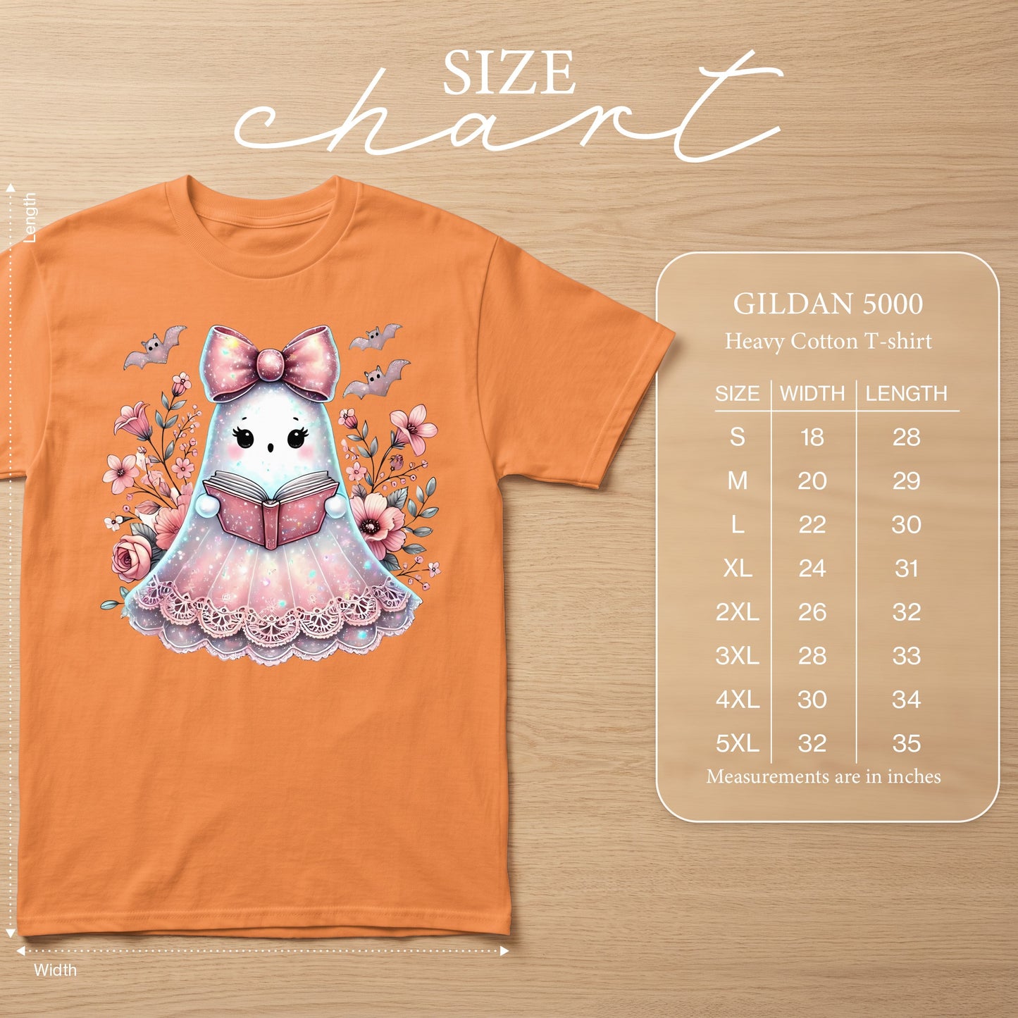 Orange t-shirt with a ghost reading a book, bats, and flowers. Size chart included.