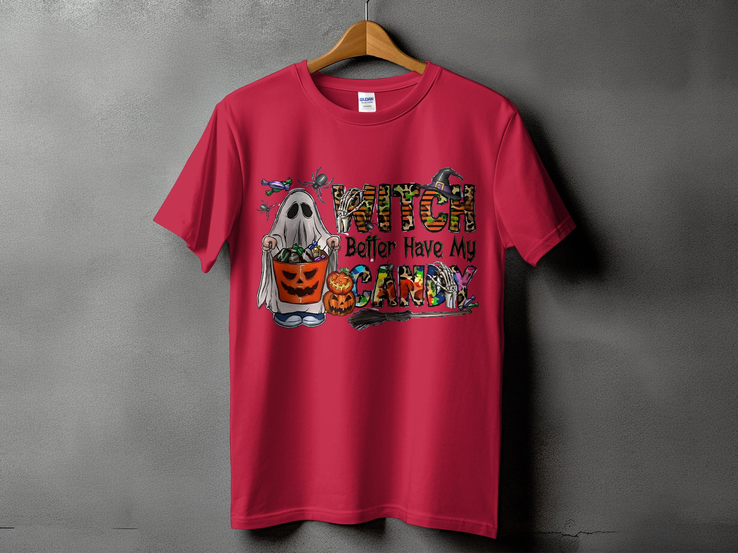 Red t-shirt with Halloween graphic featuring a ghost, pumpkins, and text "WITCH Better Have My CANDY".