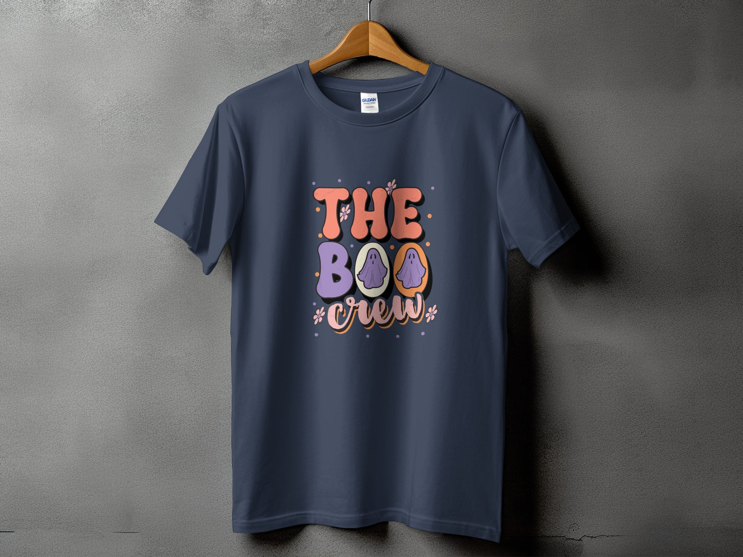 Dark blue t-shirt with "The Boo Crew" text and ghost graphics.