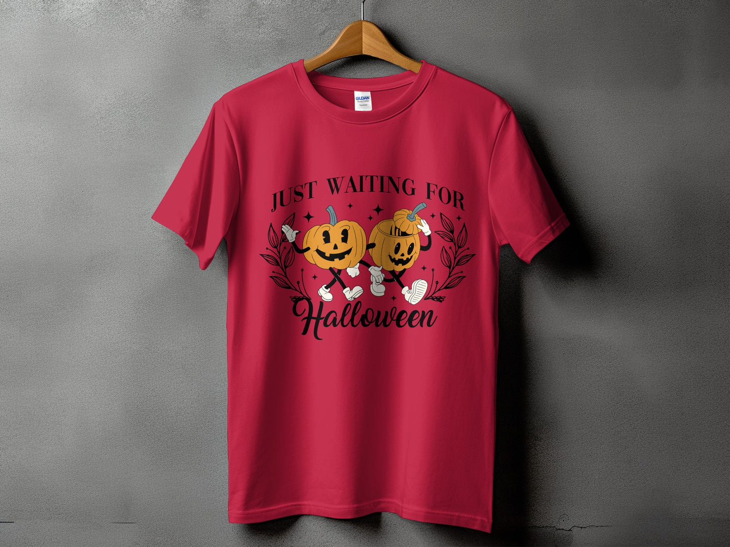 Red t-shirt with Halloween graphic: two smiling pumpkins and text "JUST WAITING FOR Halloween".