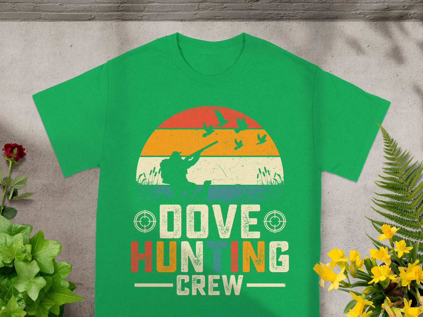 Green t-shirt with dove hunting crew graphic and distressed retro sunset.