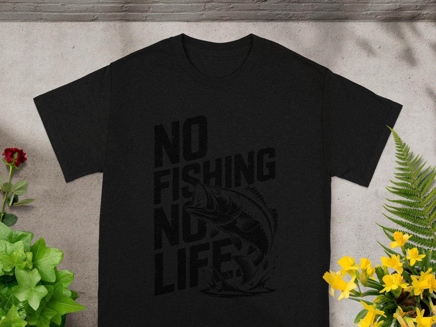 Black t-shirt with "No Fishing No Life" text and leaping bass fish graphic.