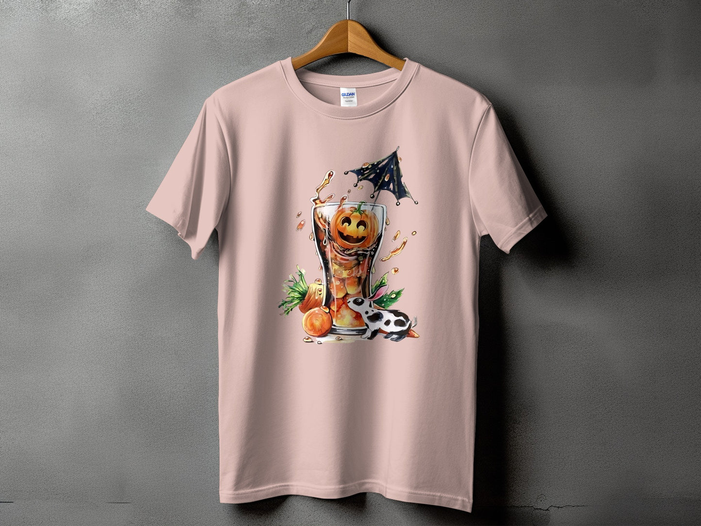 Pink t-shirt with a Halloween-themed graphic of a drink and a black and white rabbit.