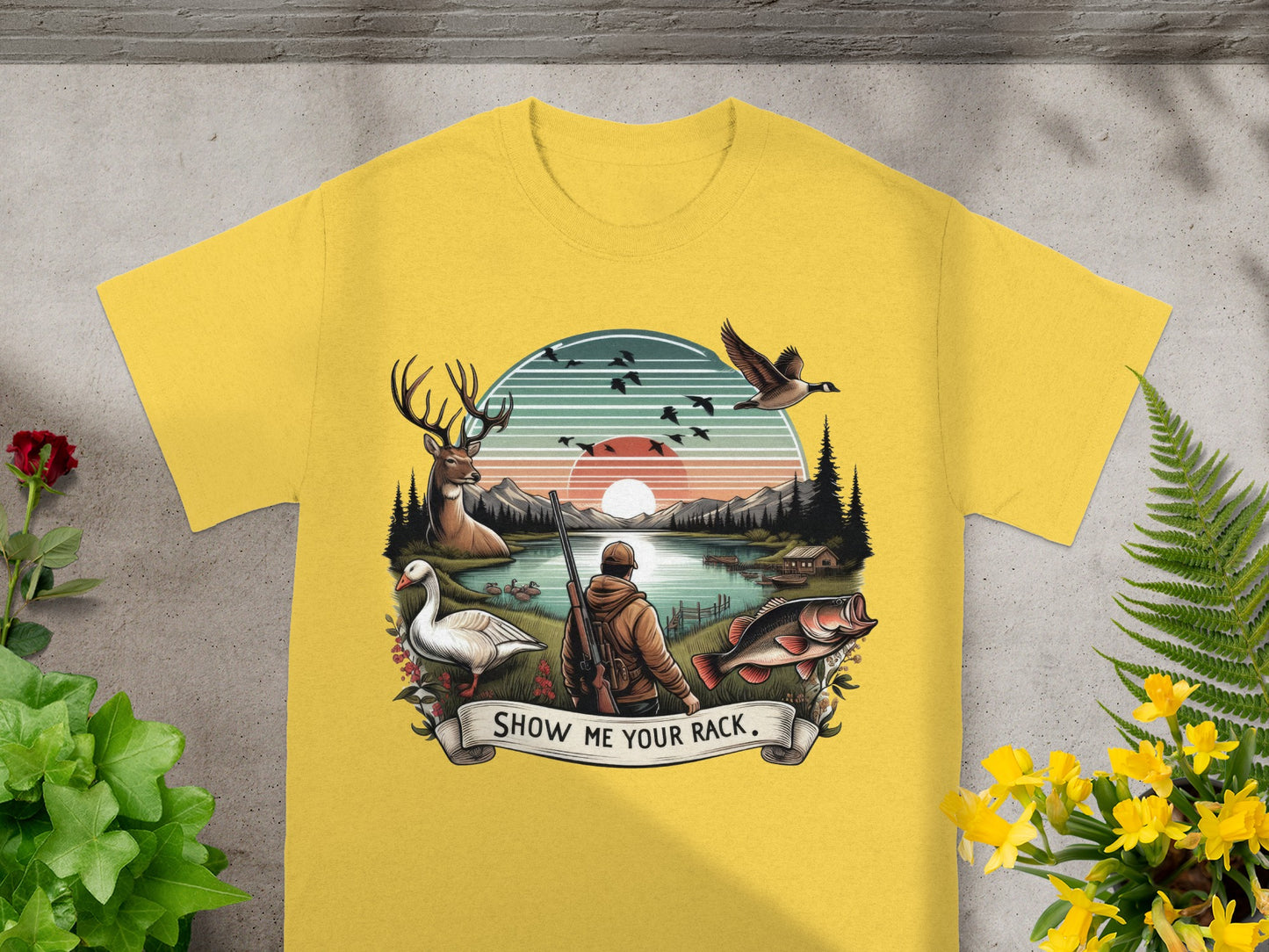 Yellow t-shirt with a hunting and fishing scene and text that reads "Show Me Your Rack."
