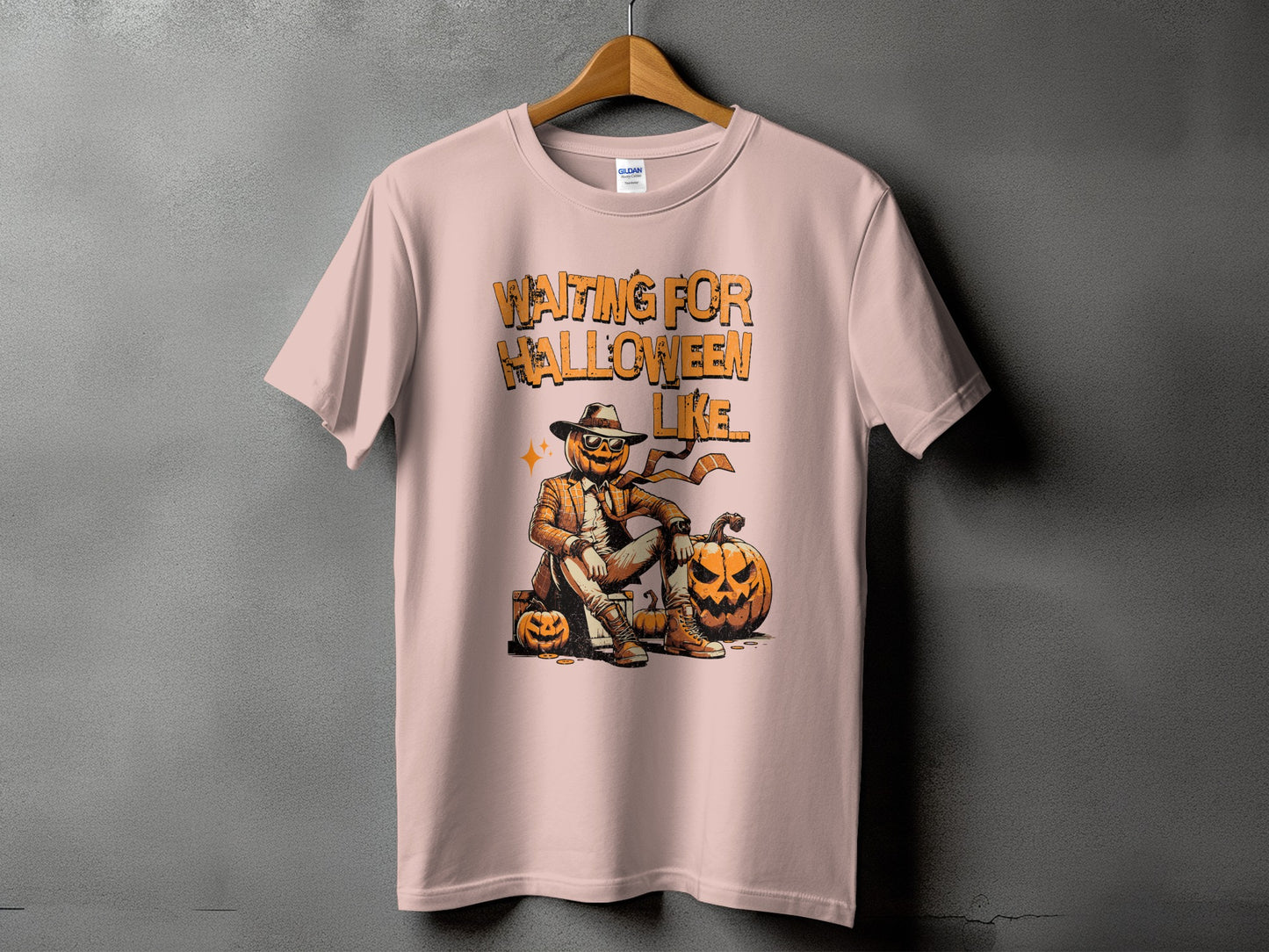 Pink t-shirt with "Waiting For Halloween Like" text and a jack-o'-lantern character.