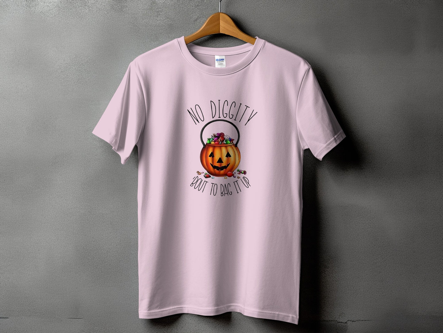 Pink t-shirt with Halloween graphic: jack-o'-lantern candy bucket, "No Diggity" and "Bout To Bag It Up."