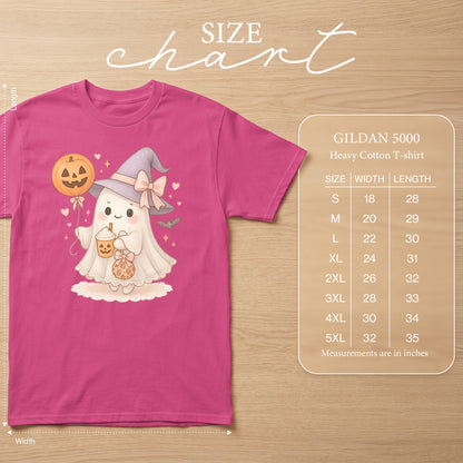 Pink t-shirt with a ghost illustration holding a pumpkin balloon and drink, with size chart.