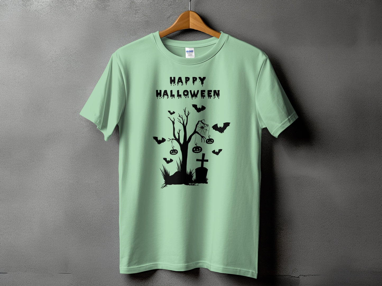 Light green t-shirt with "Happy Halloween" and black spooky tree graphic.